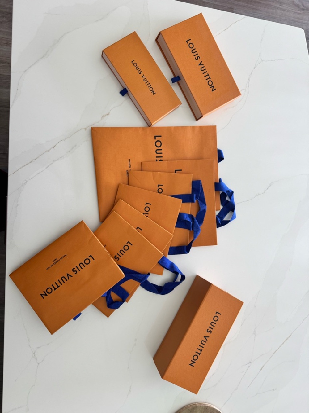Louis Vuitton Orange Gift Bags and Boxes with Blue Ribbon Accents